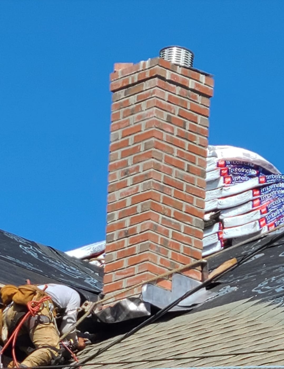 Chimney rebuild — pitch to cap